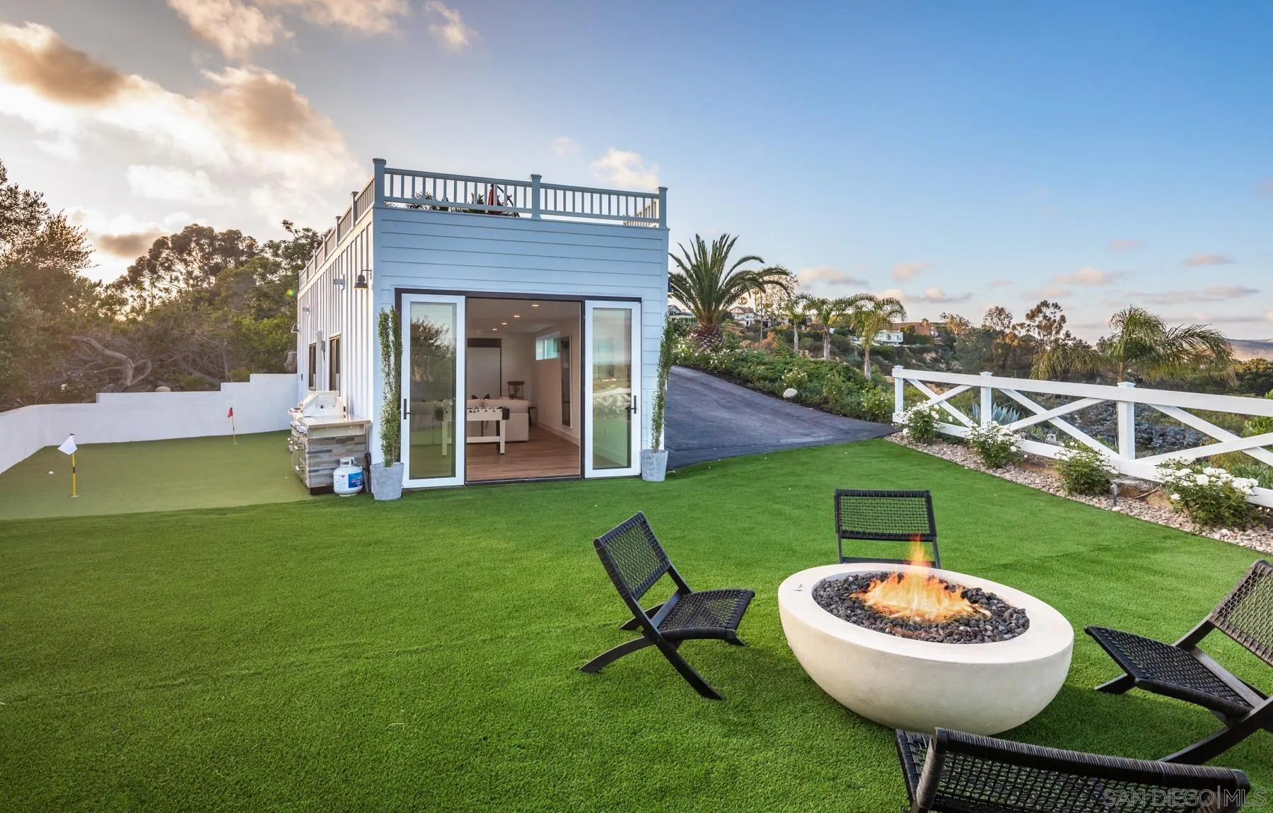 2125 Woodwind Drive Encinitas, CA 92024 - Photo 24 of 33 a view of a house with a backyard