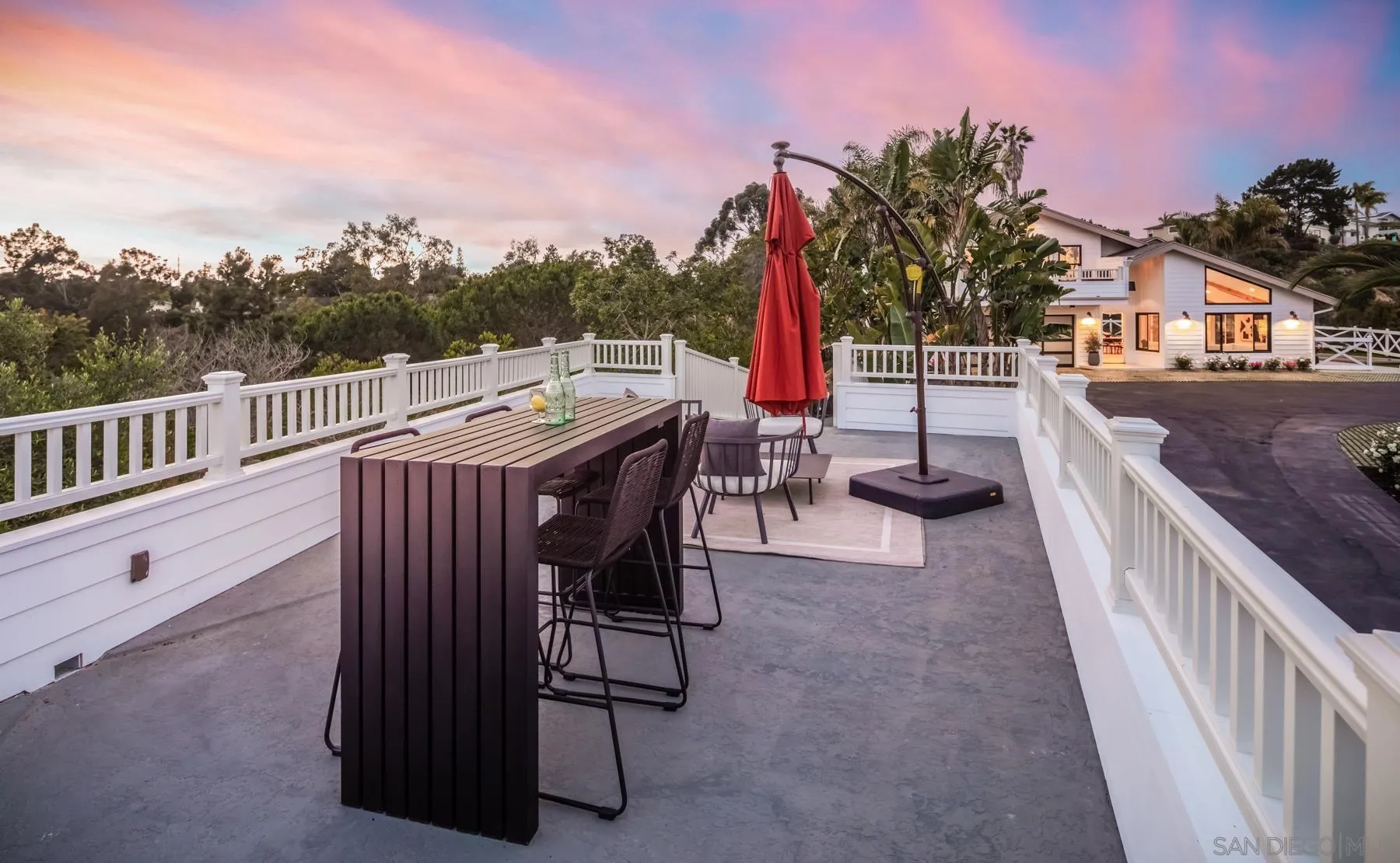 2125 Woodwind Drive Encinitas, CA 92024 - Photo 26 of 33 a view of a patio with iron fence