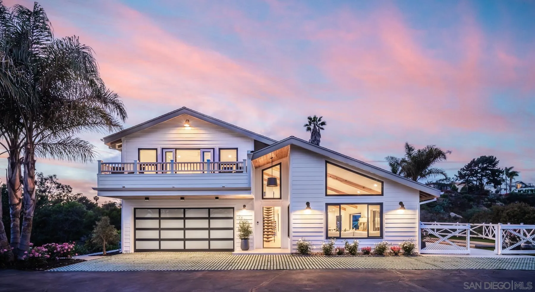 2125 Woodwind Drive Encinitas, CA 92024 - Photo 28 of 33 a front view of a house with a yard and garage