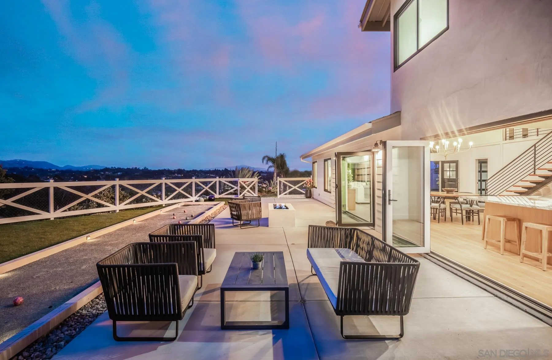 2125 Woodwind Drive Encinitas, CA 92024 - Photo 30 of 33 a view of balcony with wooden floor and couch