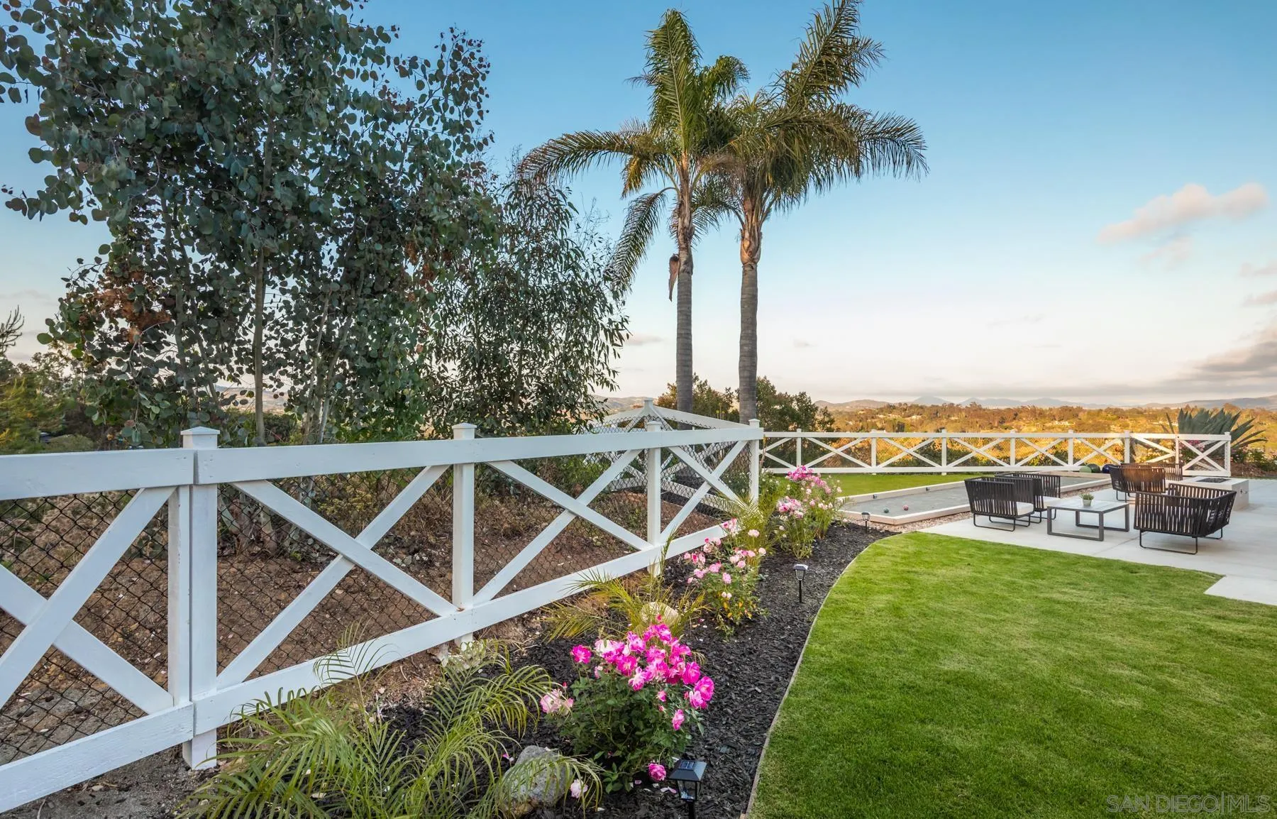 2125 Woodwind Drive Encinitas, CA 92024 - Photo 32 of 33 a view of a swimming pool with a garden and plants
