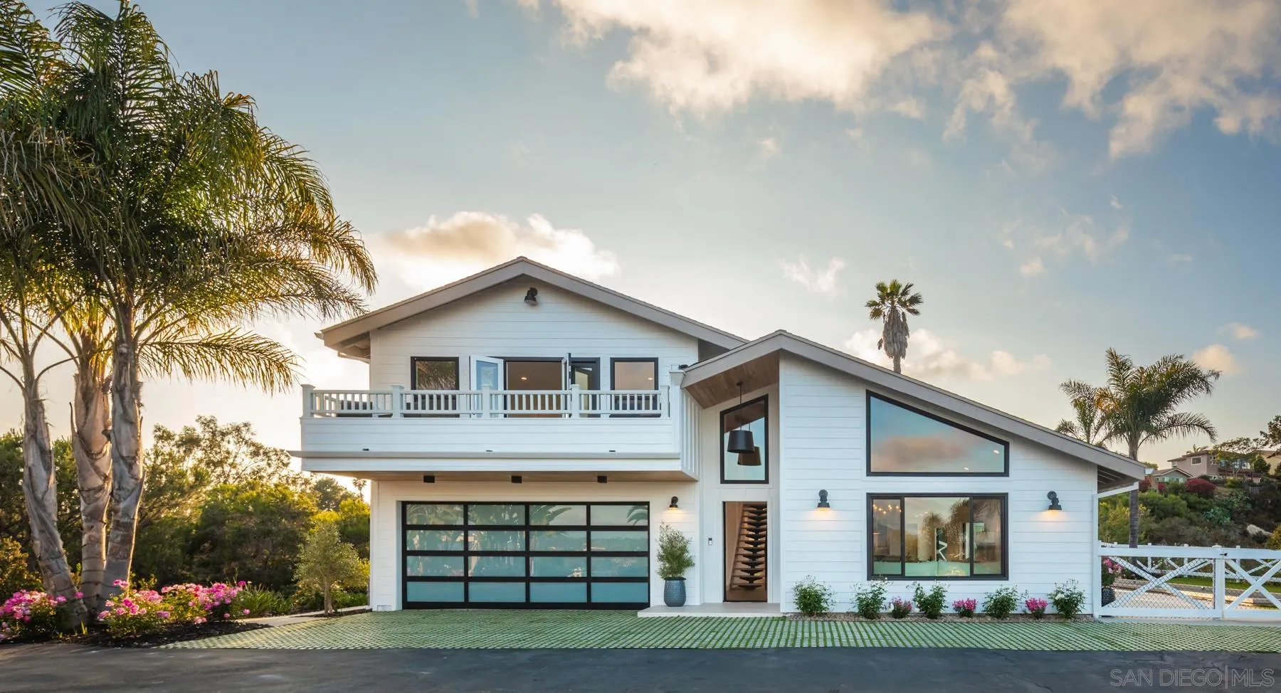 2125 Woodwind Drive Encinitas, CA 92024 - Photo 4 of 33 a front view of a house with a garden