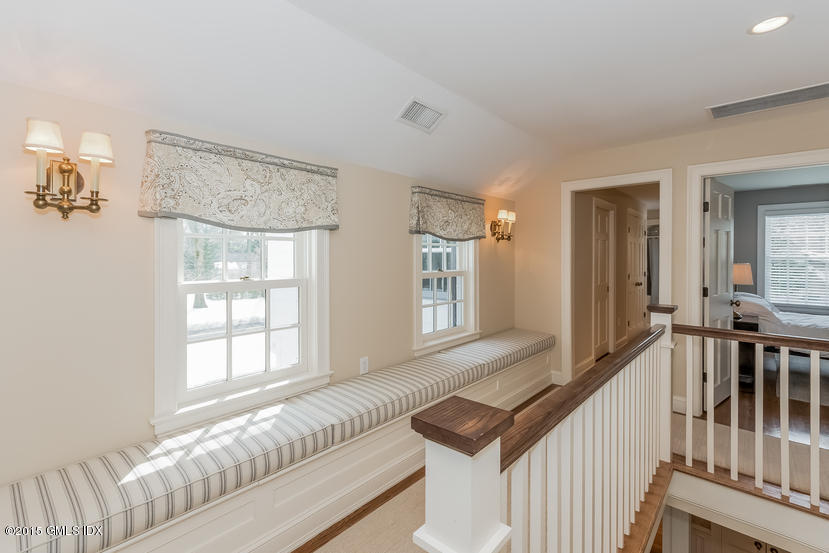 11 Owenoke Way Riverside, CT 06878 - Photo 35 of 61 a living room with furniture and a window