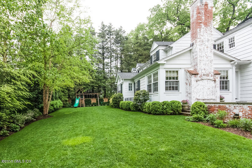 11 Owenoke Way Riverside, CT 06878 - Photo 8 of 61 a view of a house with backyard and garden
