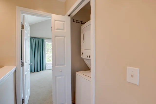 a view of hallway with washer and dryer