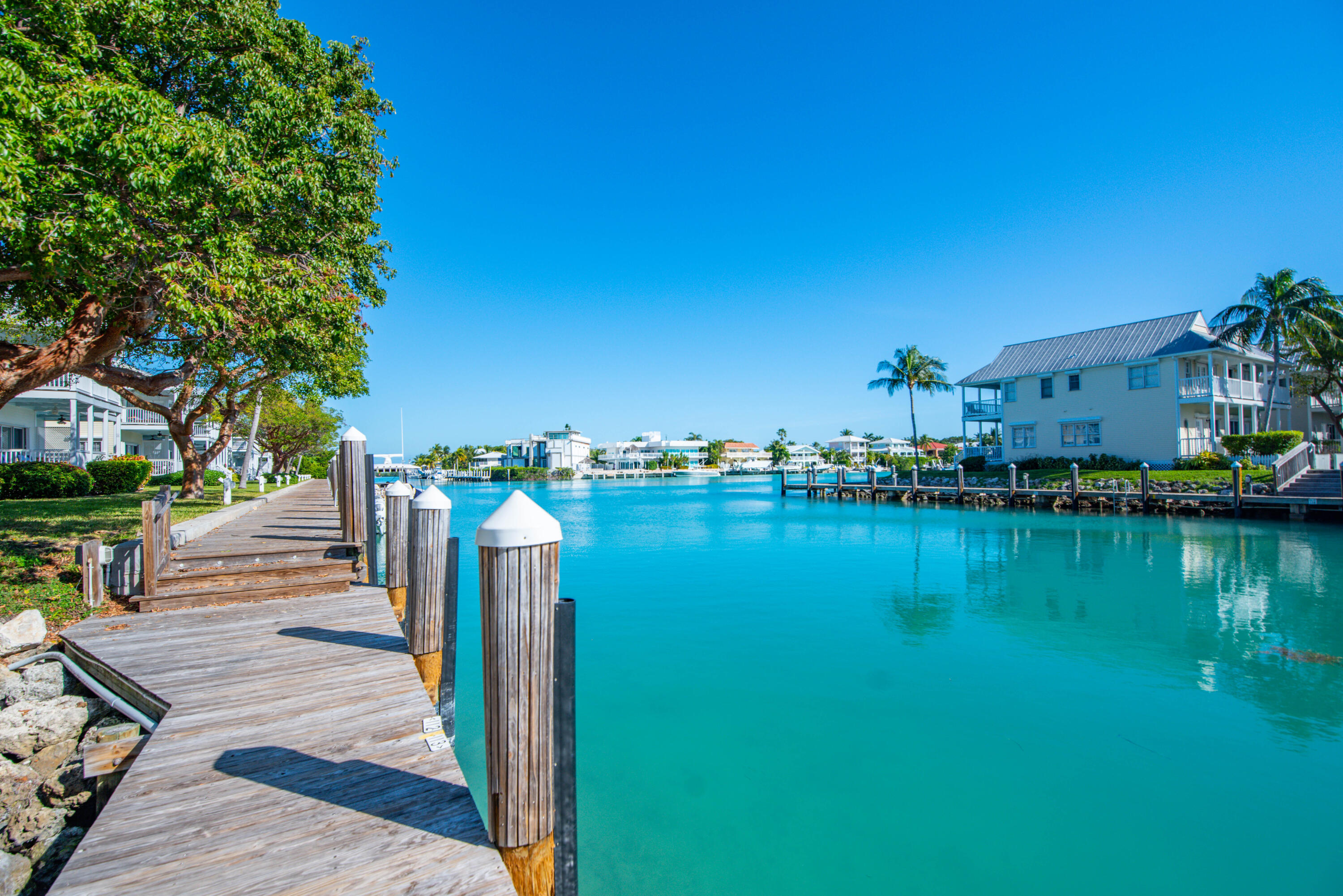 7073 Hawks Cay Boulevard Marathon, FL 33050 - Photo 39 of 50 a view of a lake with houses