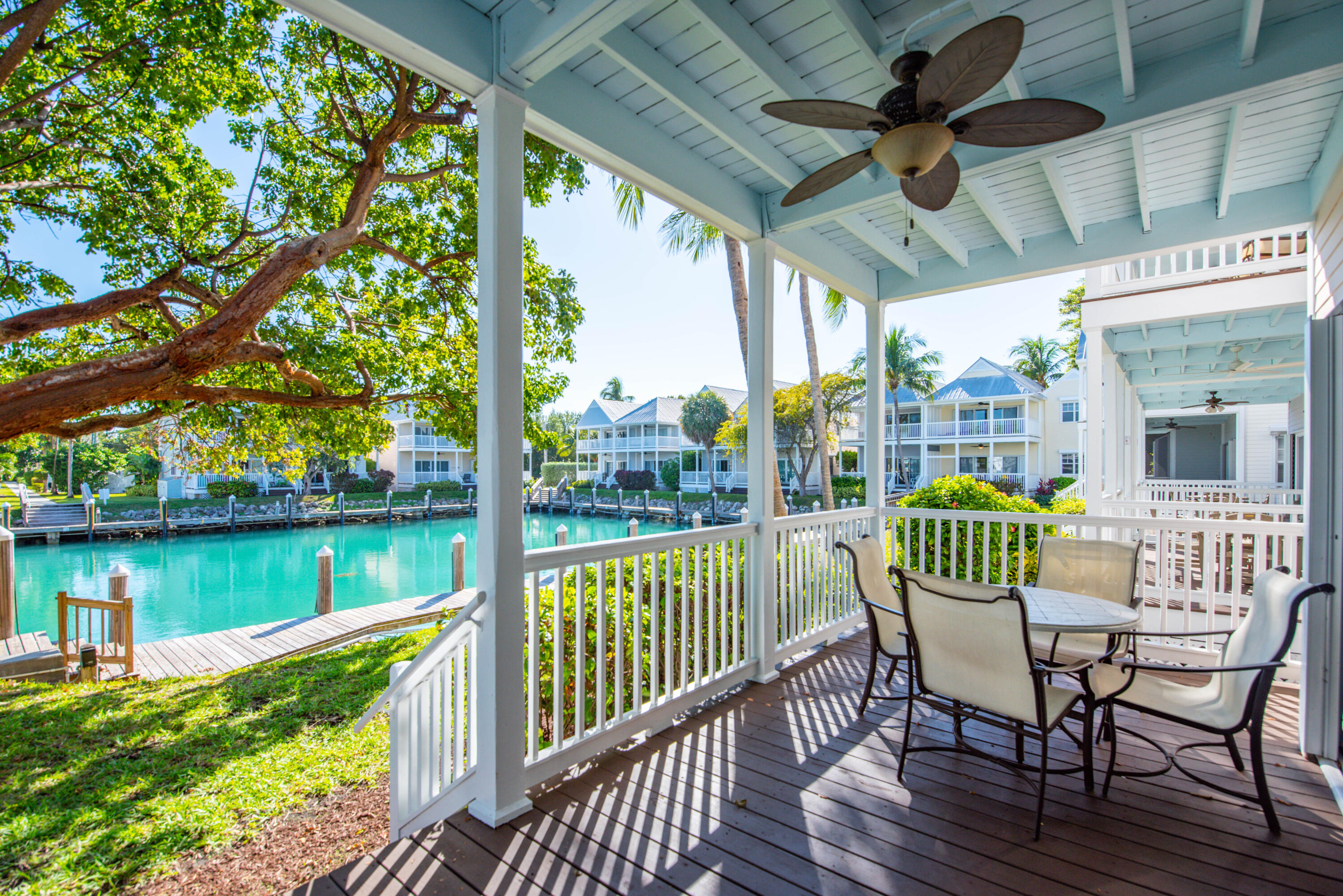 7073 Hawks Cay Boulevard Marathon, FL 33050 - Photo 4 of 50 a view of a chair and table in the balcony