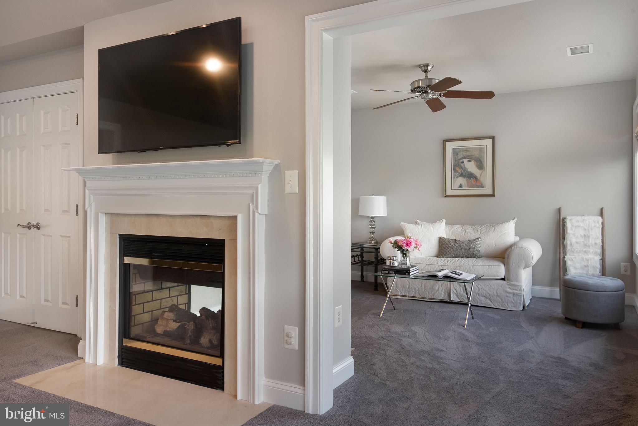 3019 Solomons Island Road Edgewater, MD 21037 - Photo 49 of 87 Owner's Suite Sitting Room and 2 Sided Fireplace