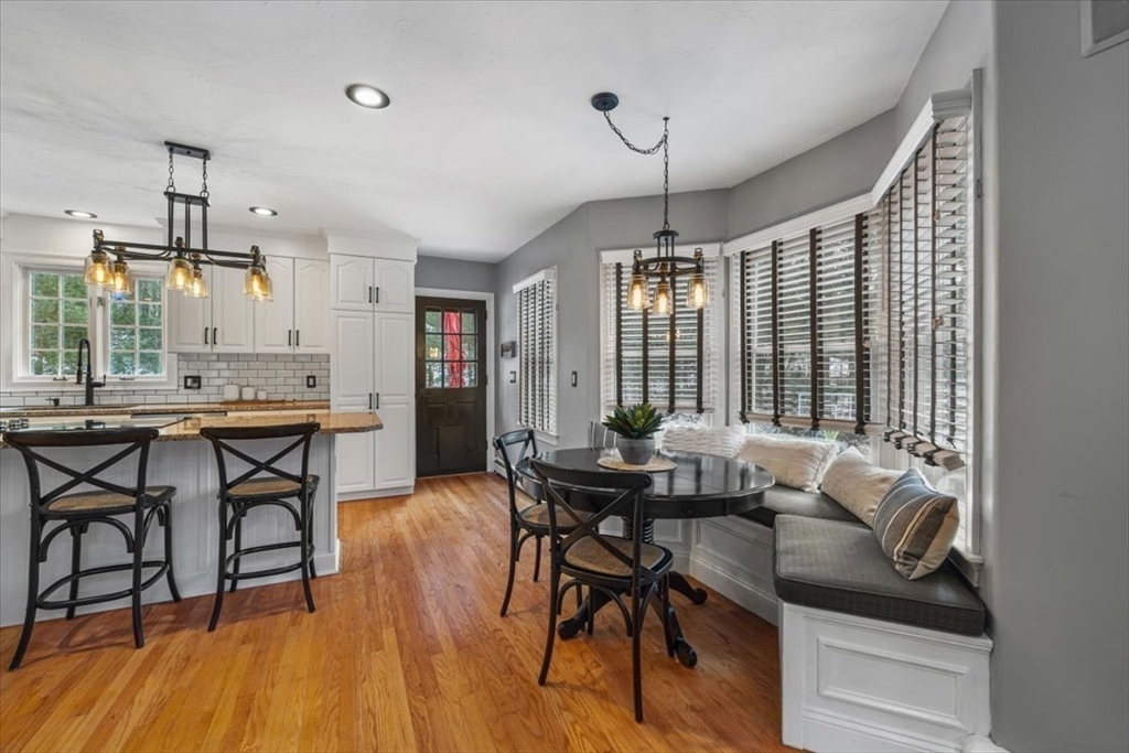 31 Round Hill Road Kingston, MA 02364 - Photo 14 of 42 a view of a dining room with furniture window and wooden floor