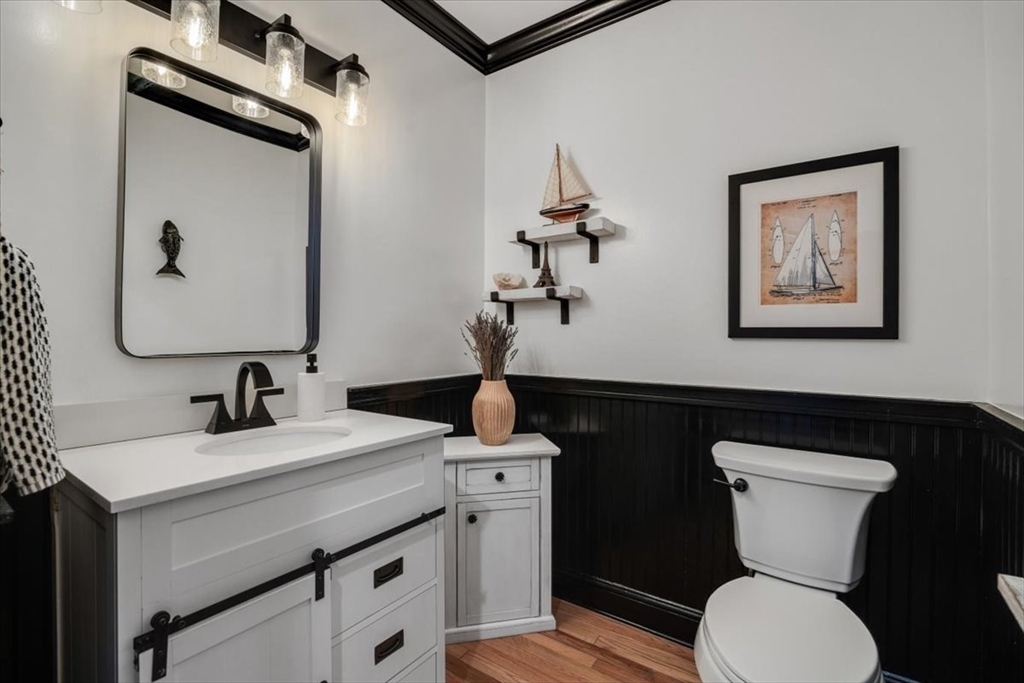 31 Round Hill Road Kingston, MA 02364 - Photo 15 of 42 a bathroom with a toilet a sink and mirror