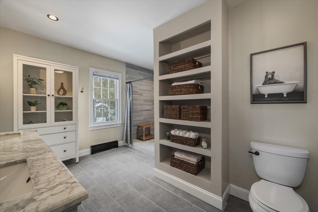 31 Round Hill Road Kingston, MA 02364 - Photo 26 of 42 a bathroom with a toilet sink and window