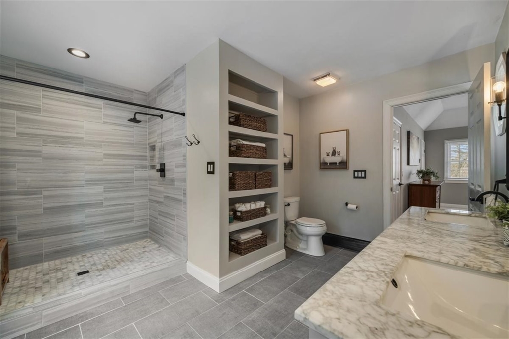 31 Round Hill Road Kingston, MA 02364 - Photo 27 of 42 a bathroom with a granite countertop sink a toilet and shower