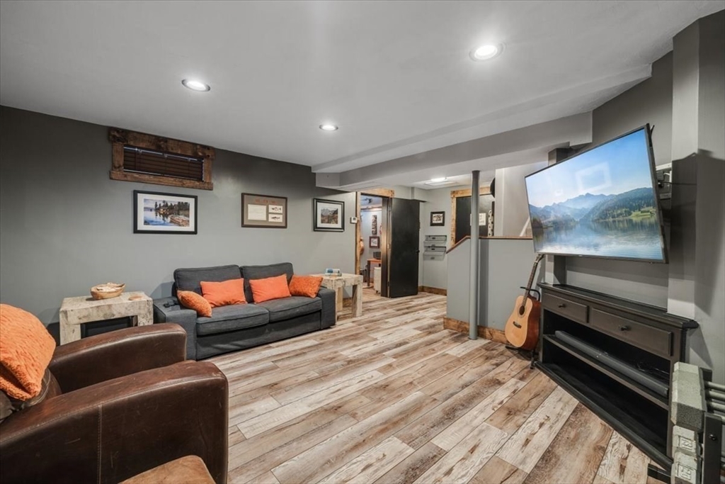31 Round Hill Road Kingston, MA 02364 - Photo 34 of 42 a living room with furniture and a flat screen tv