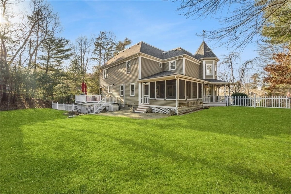 31 Round Hill Road Kingston, MA 02364 - Photo 37 of 42 a front view of a house with a garden and lake view