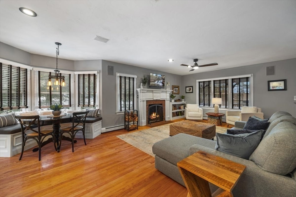 31 Round Hill Road Kingston, MA 02364 - Photo 9 of 42 a living room with furniture and a fireplace