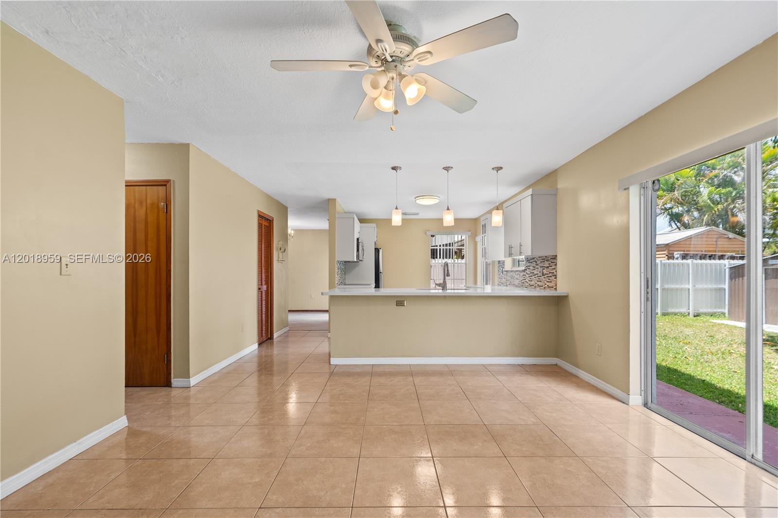 15345 Southwest 63rd Terrace Miami, FL 33193 - Photo 7 of 51 a view of an empty room with a window