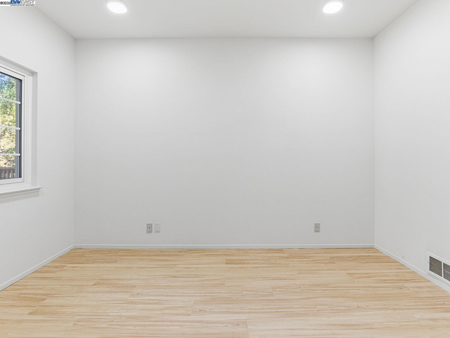1708 Lexington Avenue, Unit 2 El Cerrito, CA 94530 - Photo 34 of 60 a view of an empty room and window