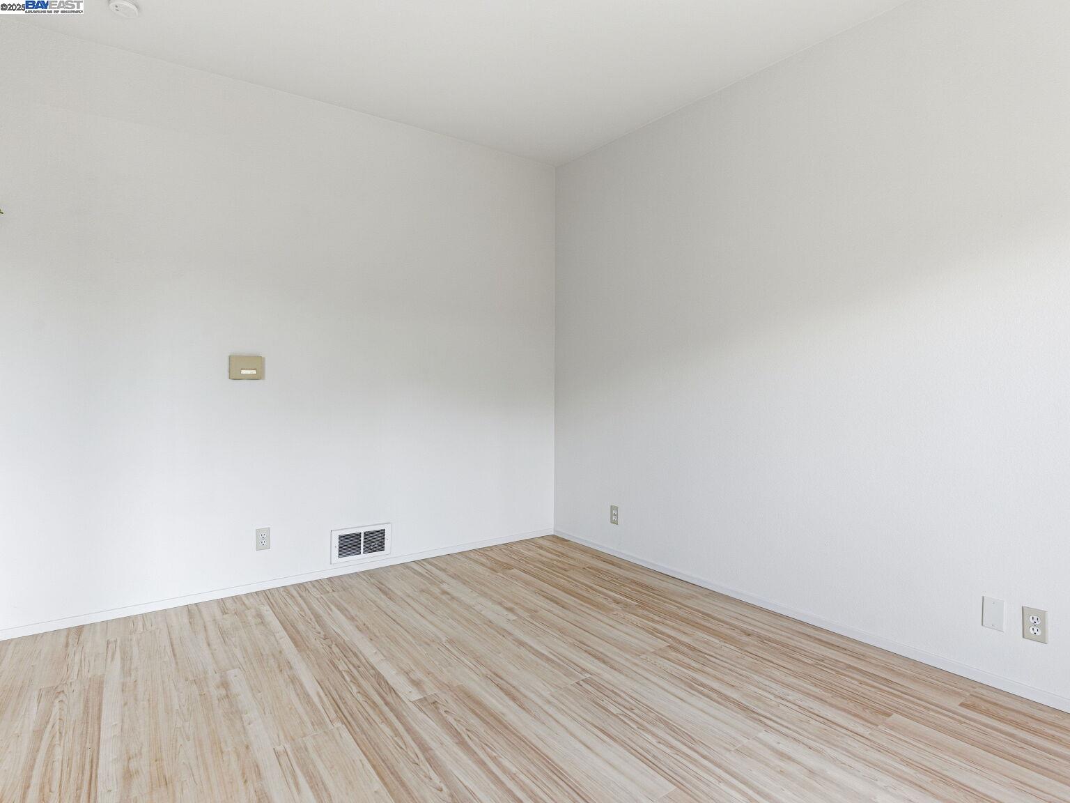 1708 Lexington Avenue, Unit 2 El Cerrito, CA 94530 - Photo 38 of 60 a view of empty room with wooden floor