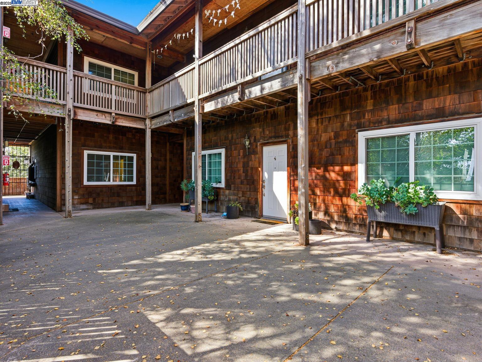 1708 Lexington Avenue, Unit 2 El Cerrito, CA 94530 - Photo 43 of 60 a view of a building with sitting area