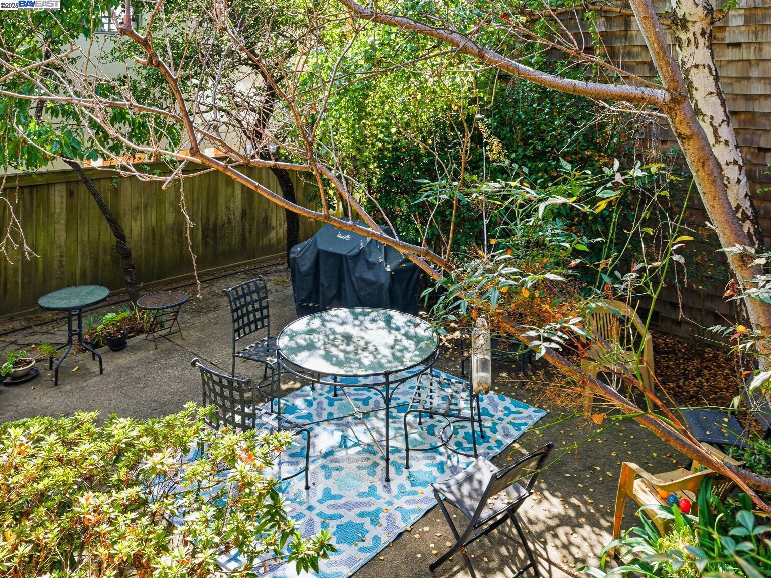 1708 Lexington Avenue, Unit 2 El Cerrito, CA 94530 - Photo 45 of 60 a backyard of a house with table and chairs