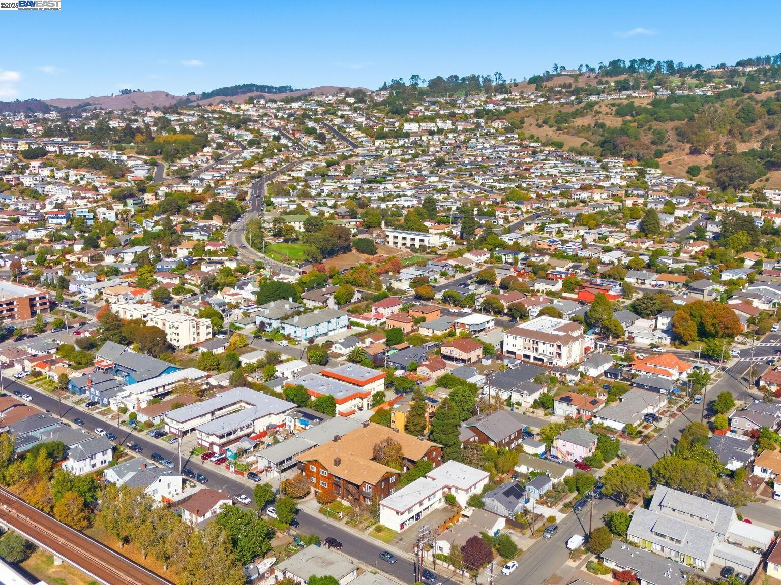 1708 Lexington Avenue, Unit 2 El Cerrito, CA 94530 - Photo 53 of 60 an aerial view of residential building with parking