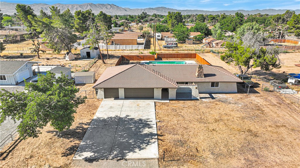 20717 Eyota Apple Valley, CA 92308 - Photo 32 of 38 a aerial view of a house with a yard