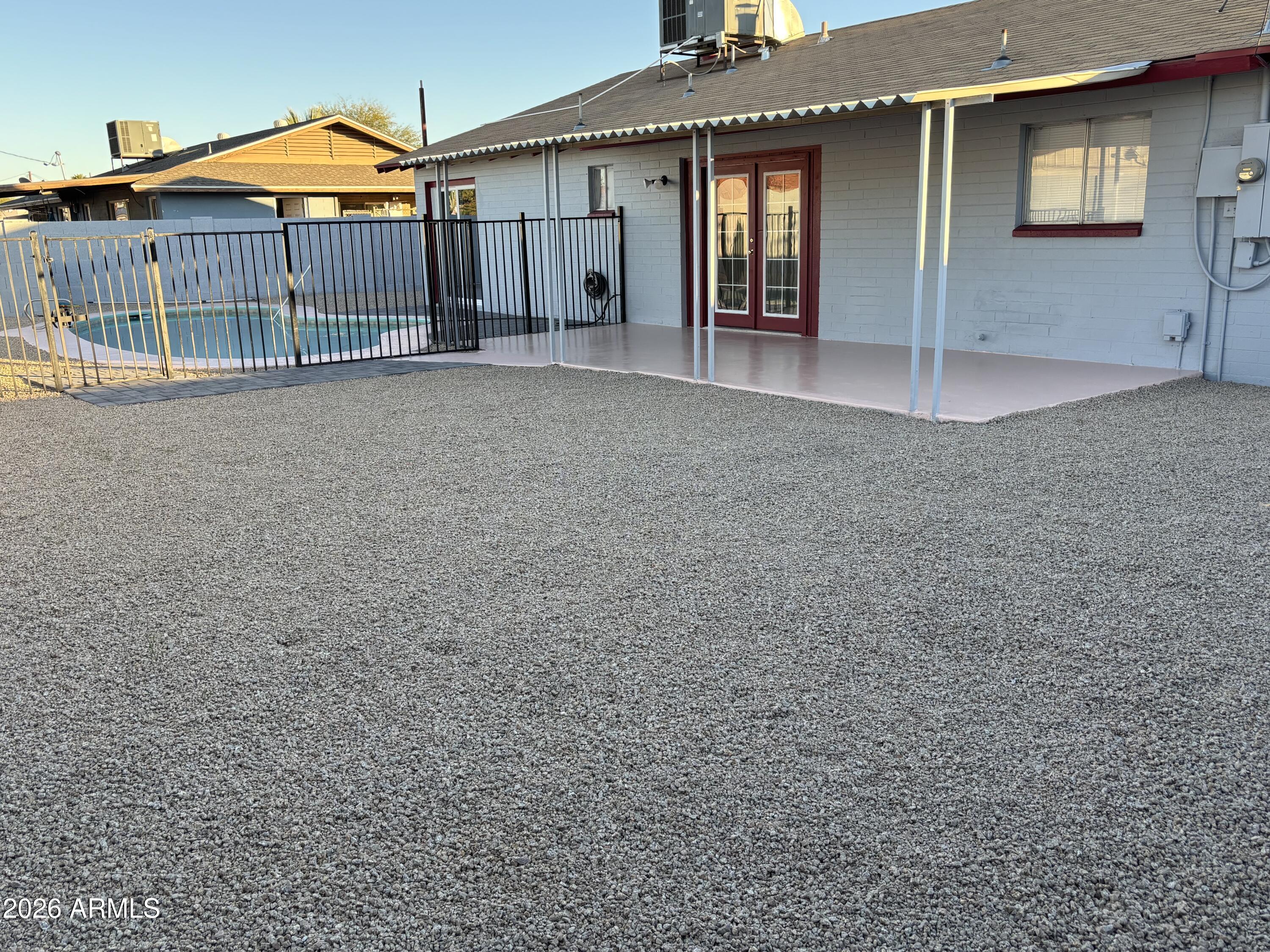 5440 Virginia Avenue Phoenix, AZ 85035 - Photo 12 of 15 a view of a house with a small yard and front a house