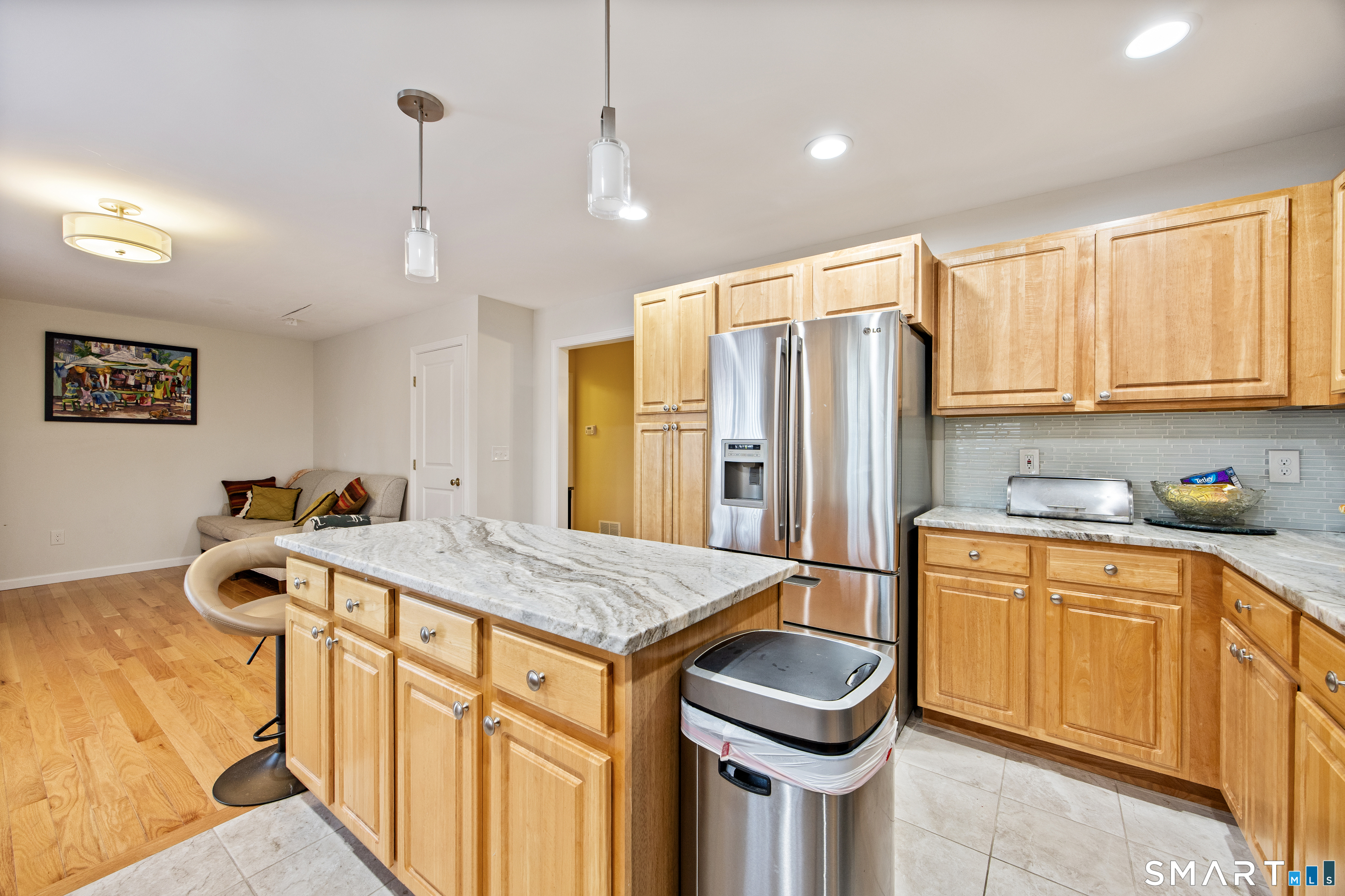27 Amber Place Waterbury, CT 06705 - Photo 6 of 33 a kitchen with stainless steel appliances granite countertop a sink refrigerator and cabinets