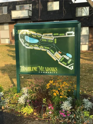 a sign broad in front of a building