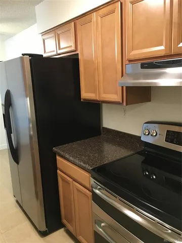 a close view of stove and microwave