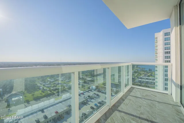 a view of a balcony with an outdoor space