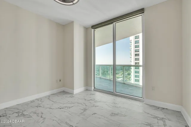 a view of an empty room and window