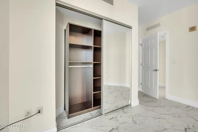 a view of a room with an empty space