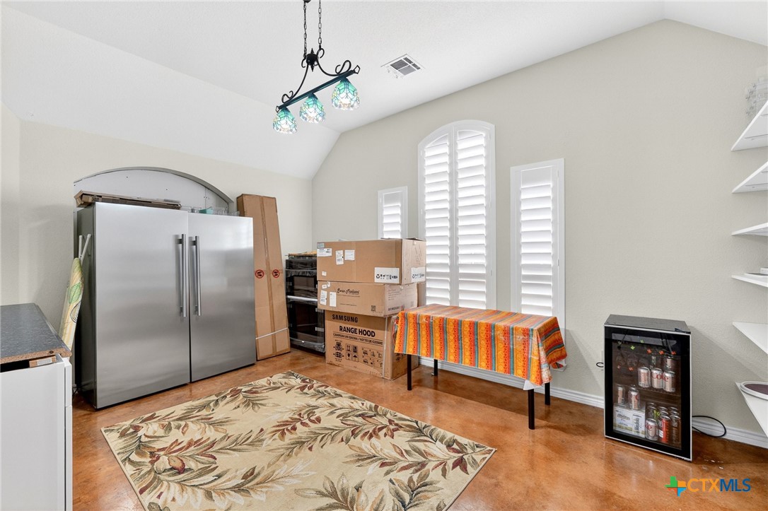 421 Sunset Ridge Drive Killeen, TX 76549 - Photo 20 of 47 a living room with a bed furniture and a window