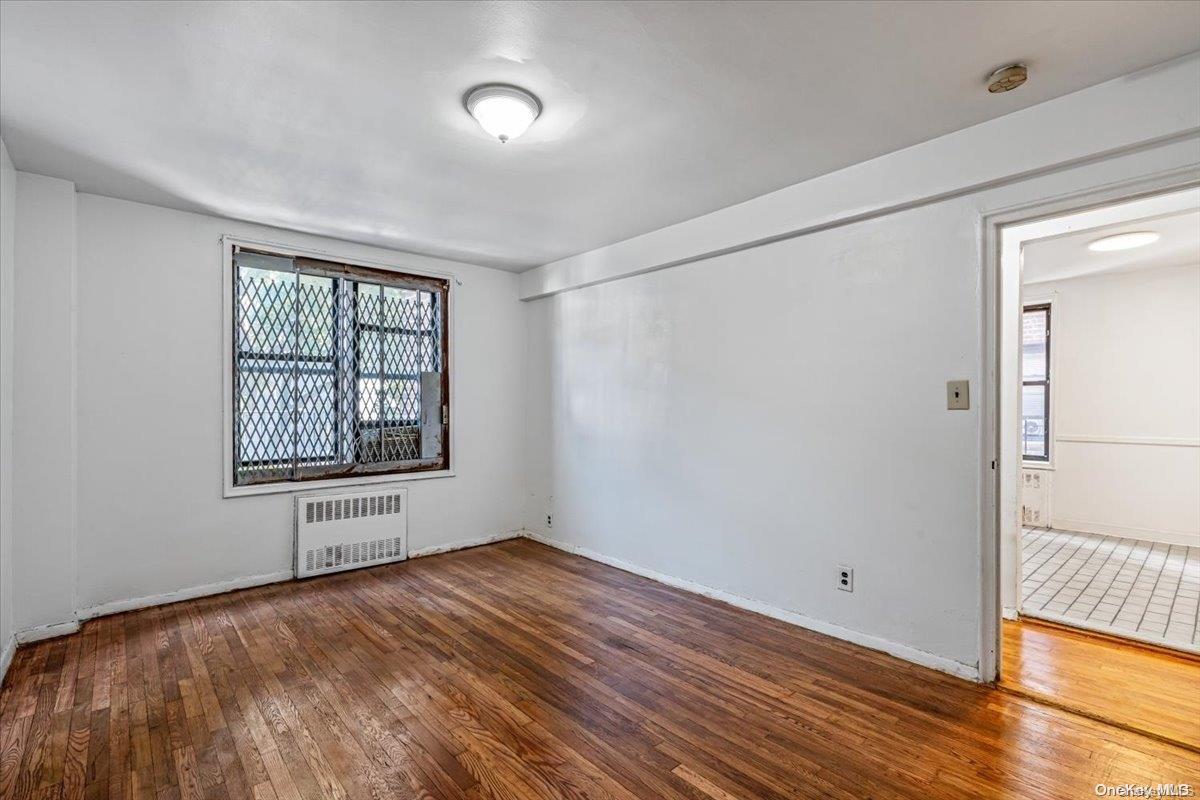 2860 Bailey Avenue, Unit 4F Bronx, NY 10463 - Photo 15 of 19 a view of empty room with wooden floor and fan