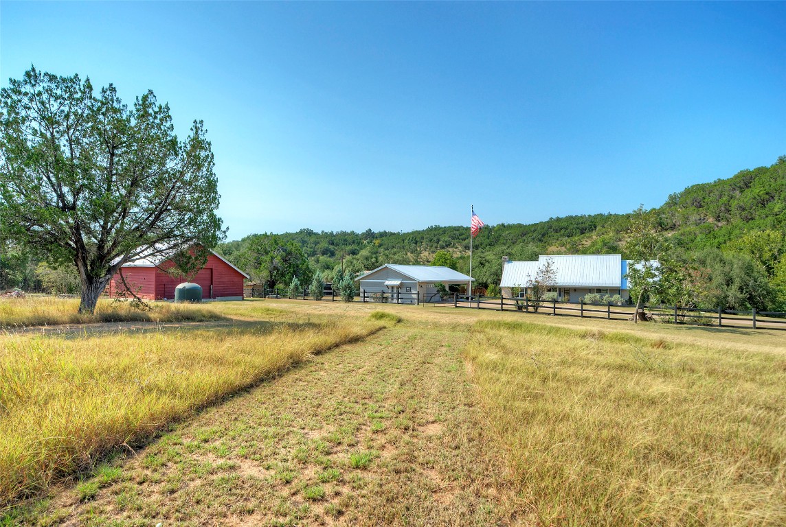 101 Arrowlake Road Wimberley, TX 78676 - Photo 2 of 40 a view of an outdoor space and swimming pool