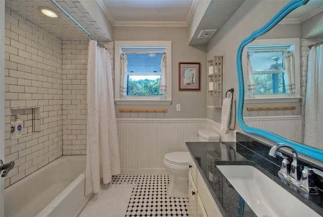 a bedroom with bed and hallway