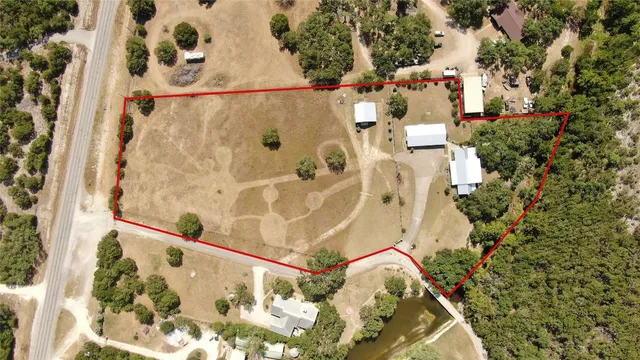 a view of a lake with top of house