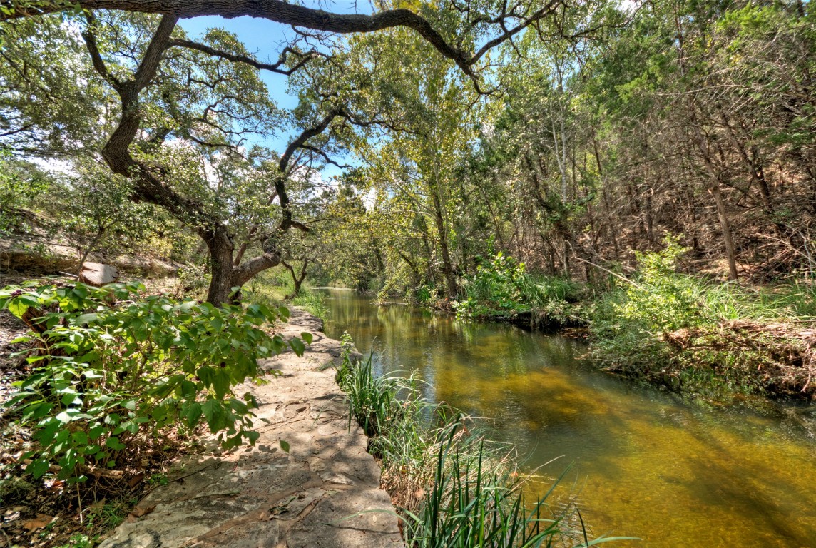 101 Arrowlake Road Wimberley, TX 78676 - Photo 7 of 40 a view of a lake with top of house