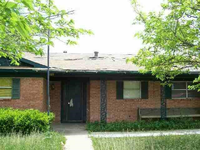 1018 17th Street Ralls, TX 79357 - Photo 1 of 1 a backyard of a house with lots of green space