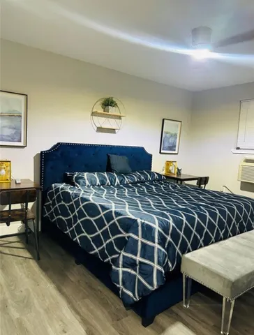 a bed room with a bed and a couch