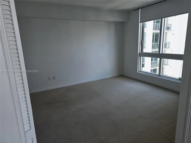 an empty room with a window