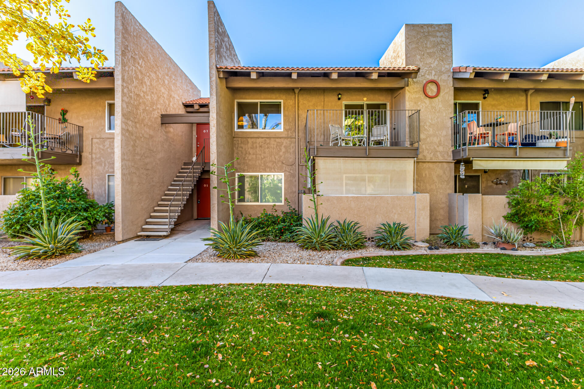 a front view of a house having yard
