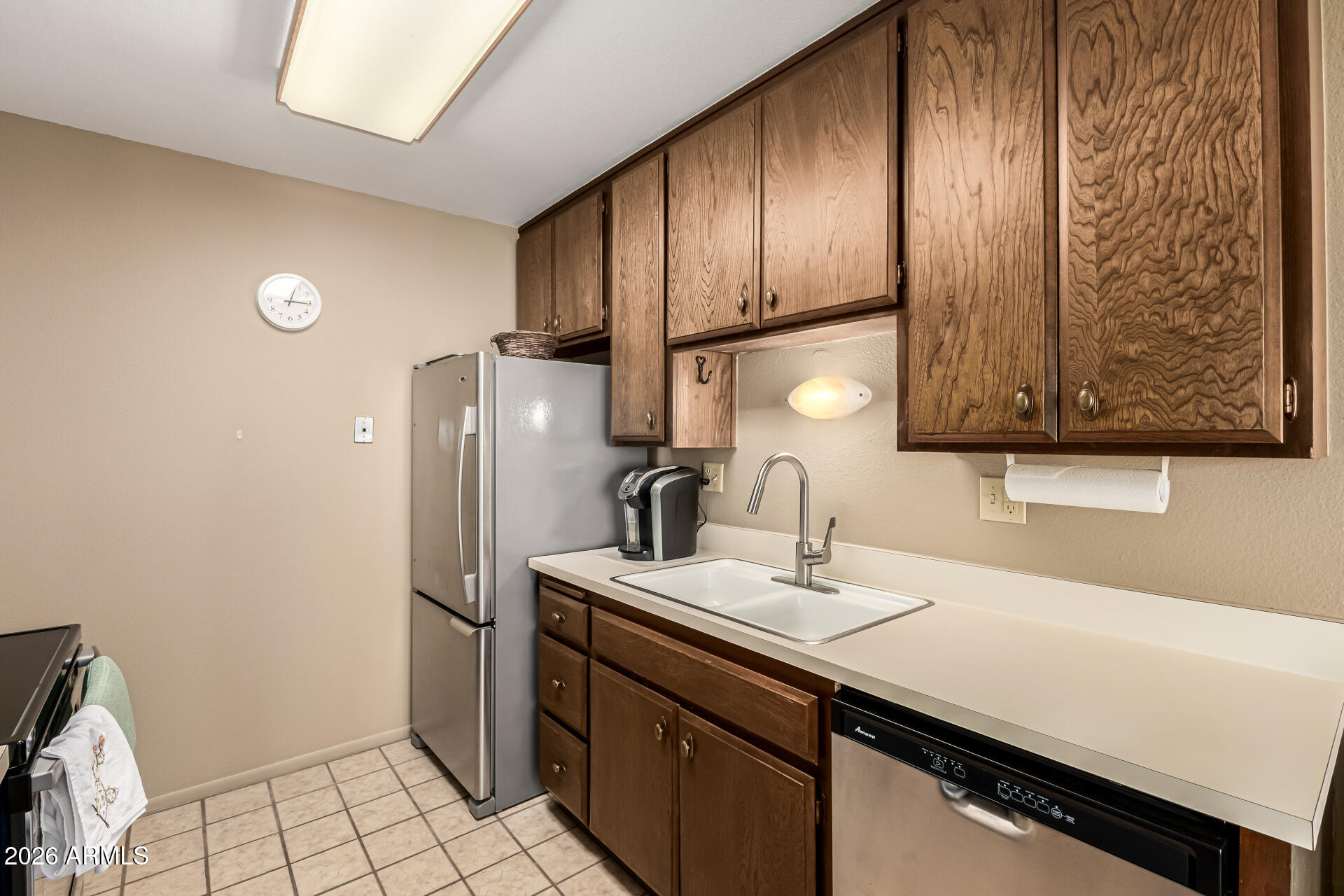 5525 East Thomas Road, Unit O8 Phoenix, AZ 85018 - Photo 12 of 32 a bathroom with a sink and a mirror