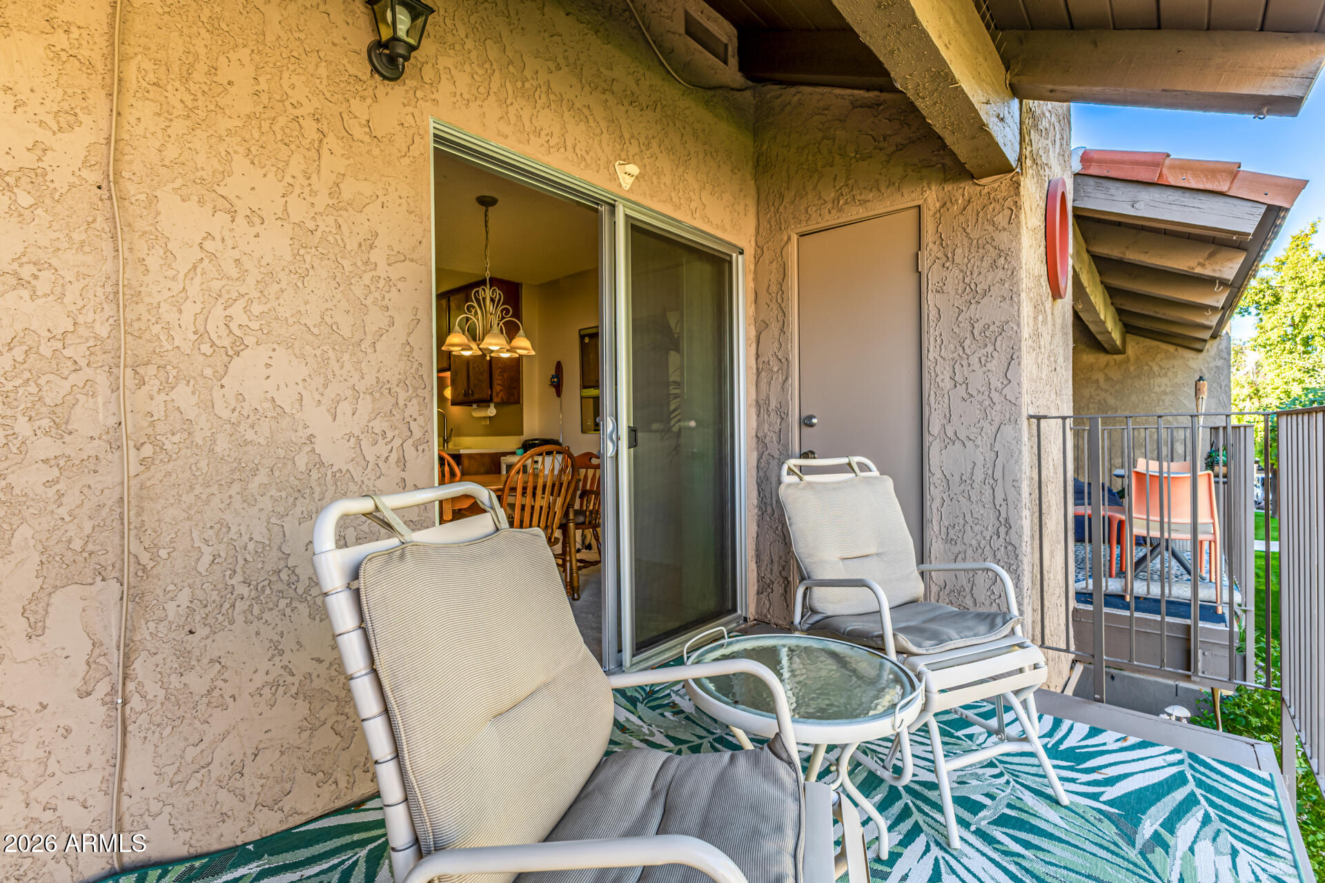 5525 East Thomas Road, Unit O8 Phoenix, AZ 85018 - Photo 22 of 32 a living room with furniture and a window