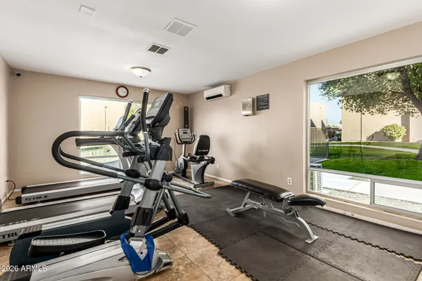 a view of a room with gym equipment