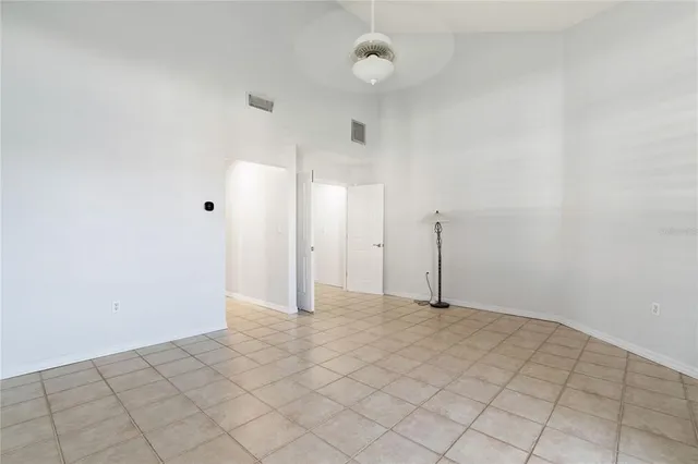 a bathroom with a granite countertop sink a shower and a mirror