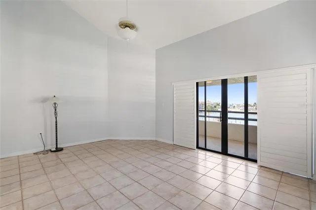 a bathroom with a sink a toilet a mirror and shower