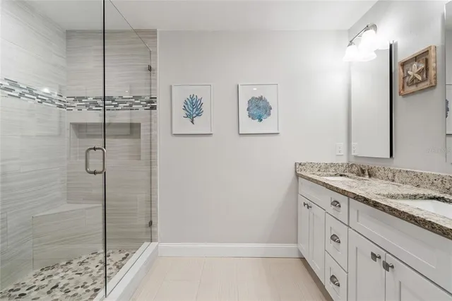 a view of a chairs and table in the balcony