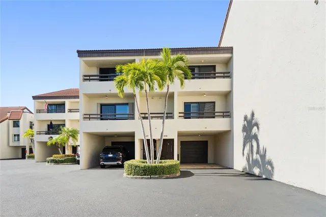 a view of living room with furniture and a fireplace